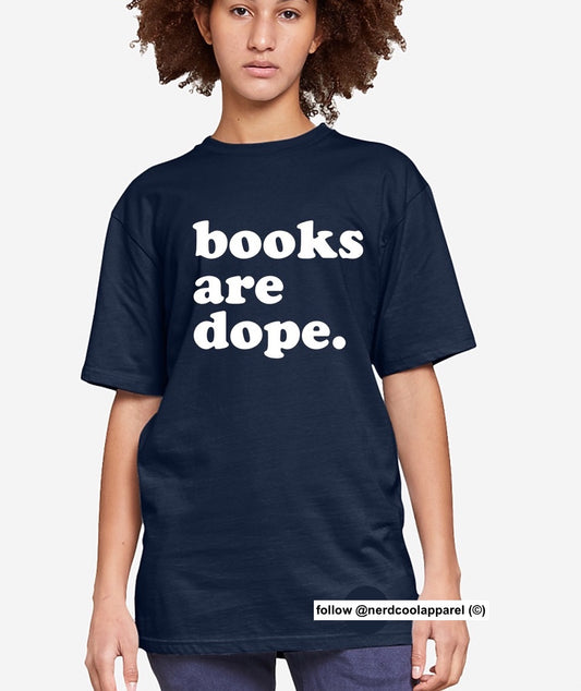 Person wearing a navy blue t-shirt with 'books are dope.' text on a white background