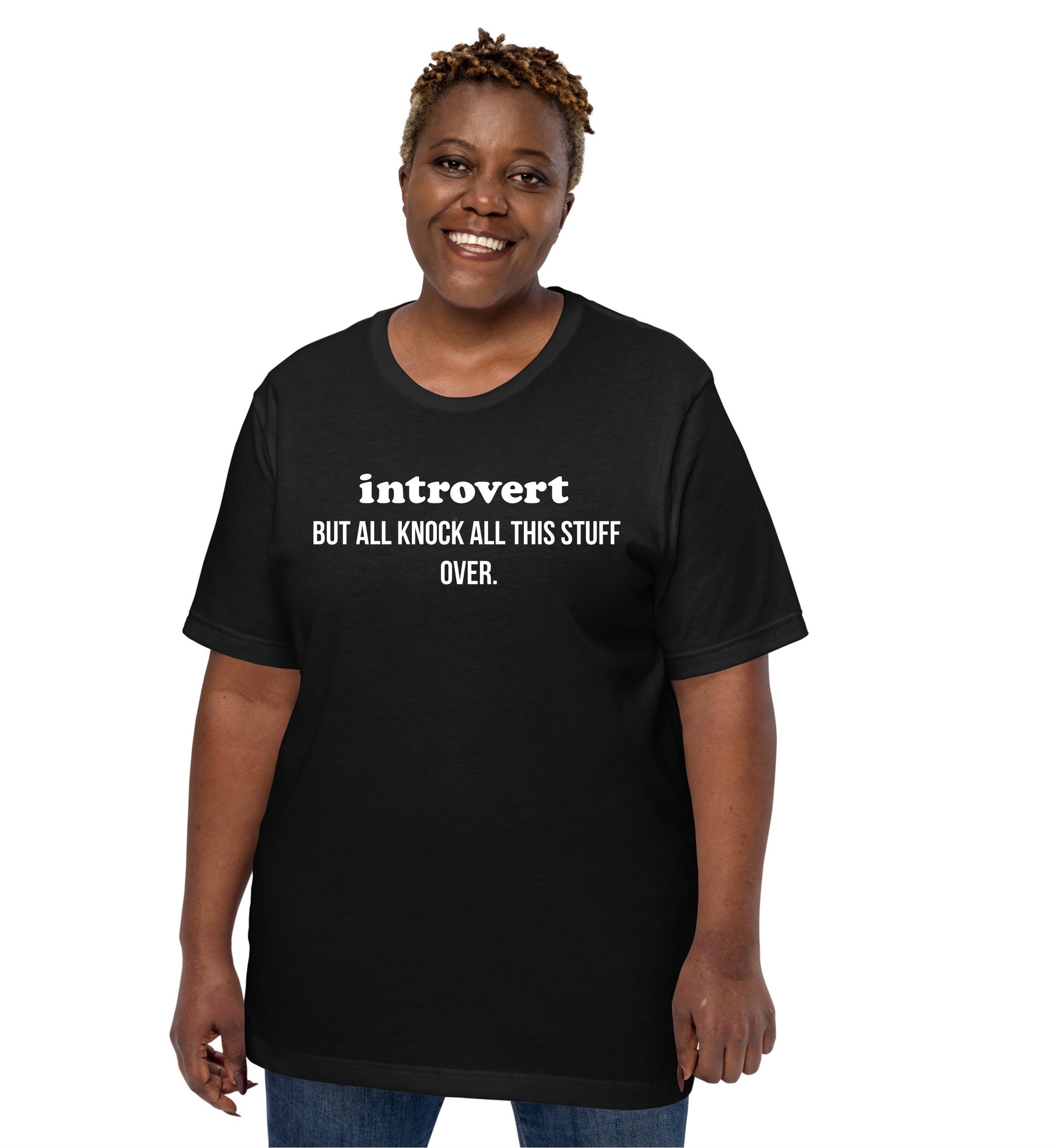 Person wearing a black t-shirt with text, standing against a white background