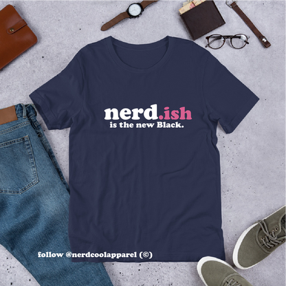 Navy blue t-shirt with 'nerd.ish is the new Black' text on a gray surface with jeans, shoes, and accessories.