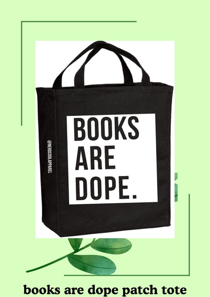 Black tote bag with 'BOOKS ARE DOPE.' text on a light green background