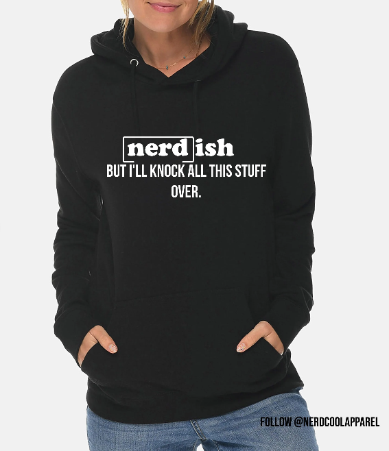 Black hoodie with text 'nerdish BUT I'LL KNOCK ALL THIS STUFF OVER.' worn by a person on a white background.